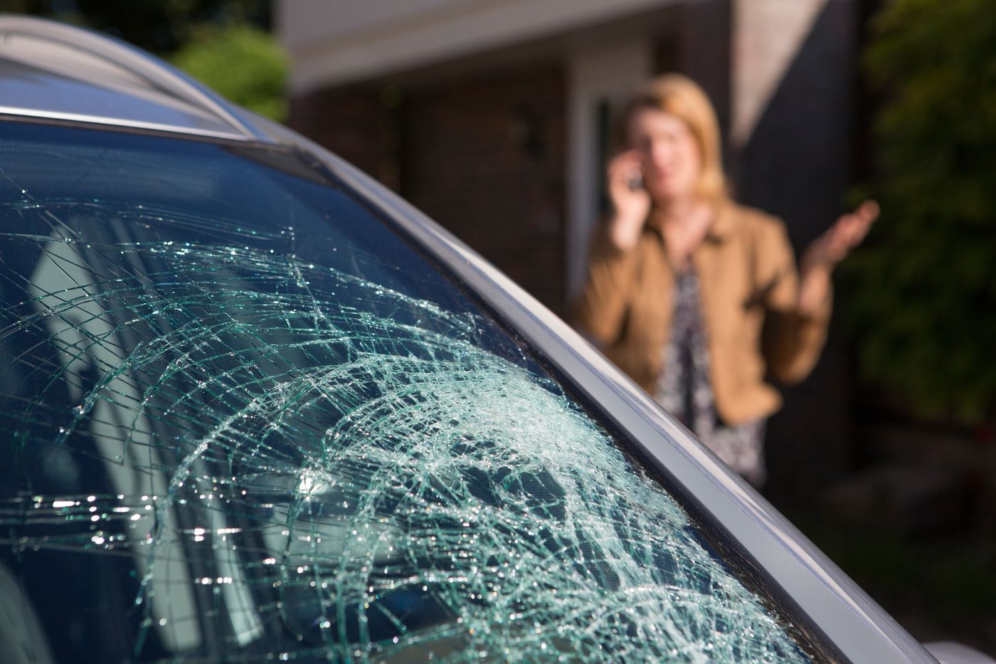 Driver dealing with a cracked windshield